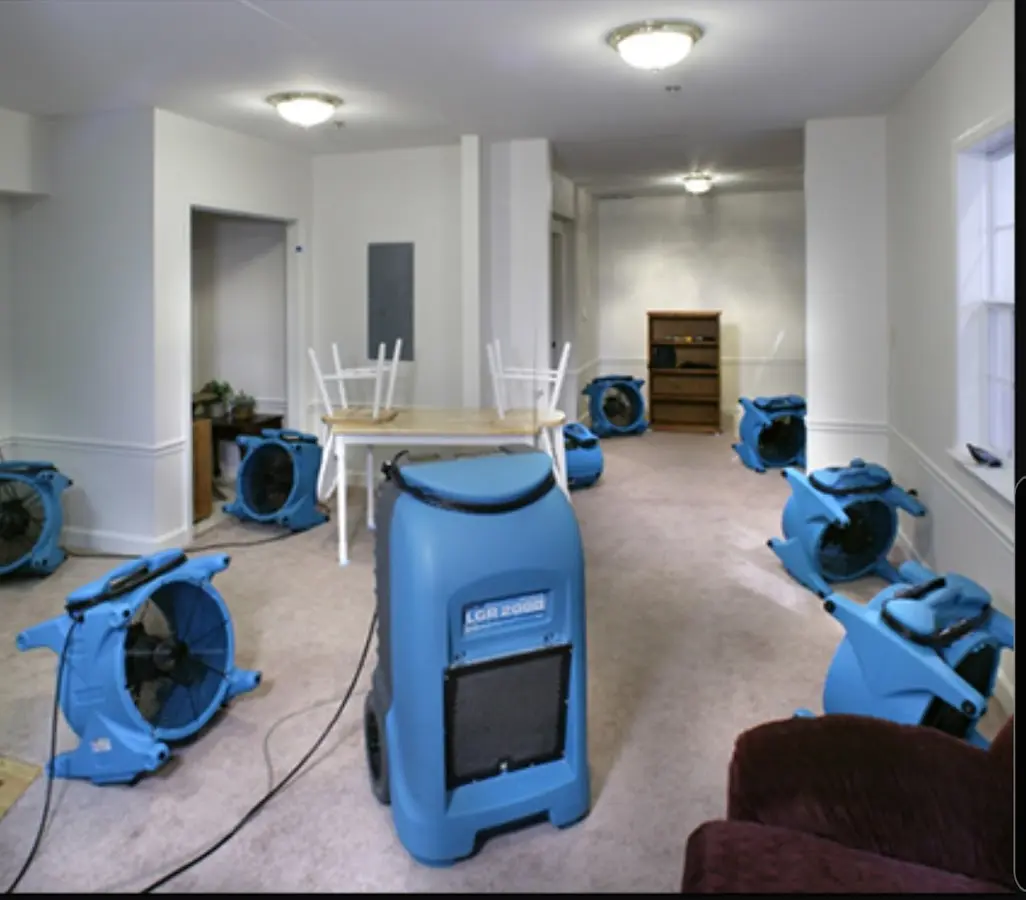 Air movers and dehumidifier setup for Water Extraction & Removal in Bangor Base